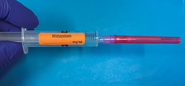 Left handed pre-filled syringe